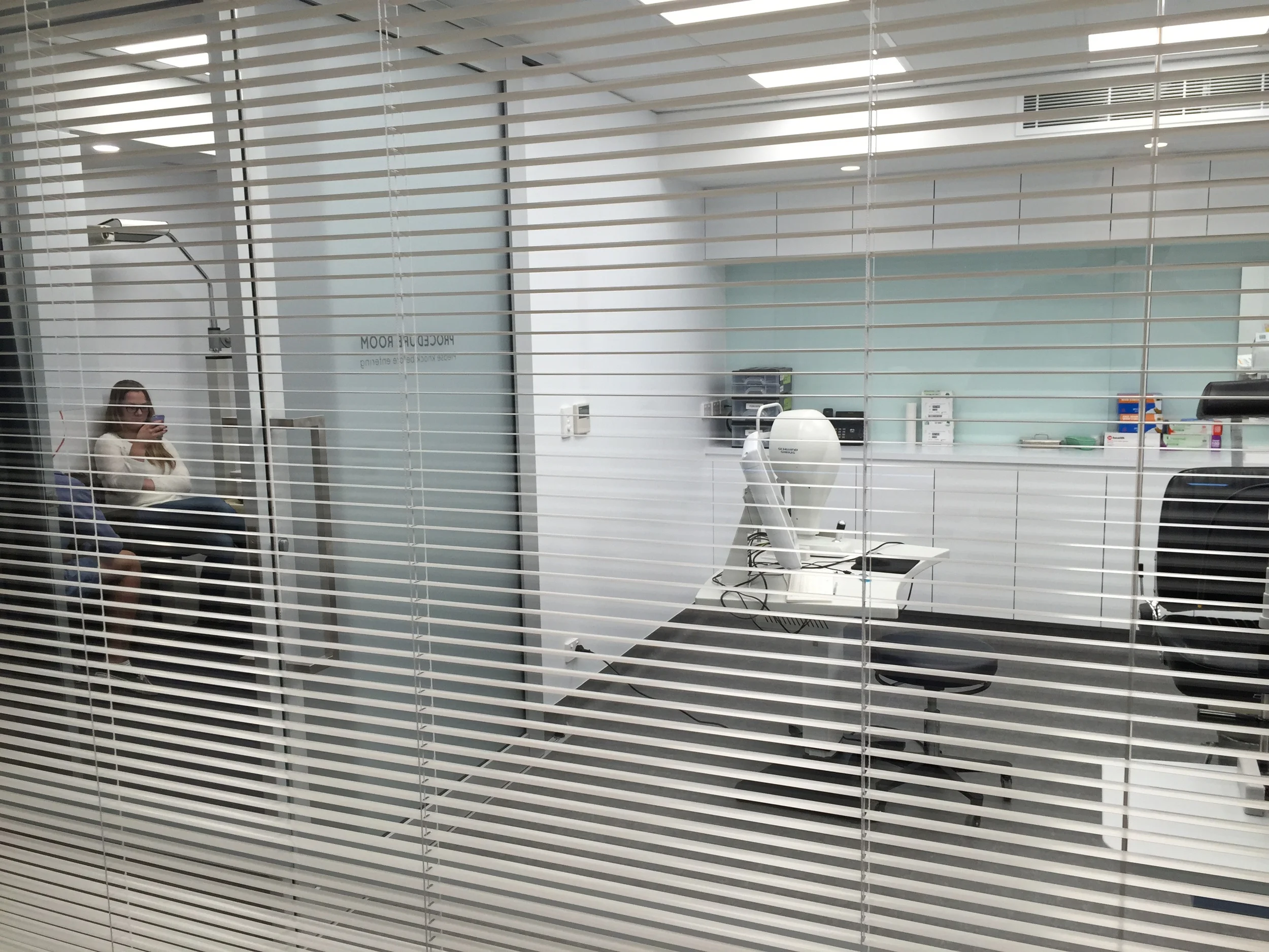  Venetians in this small orthoptist room allows procedures in Procedure room to be viewed when required and also increases the perception of space in this room. 