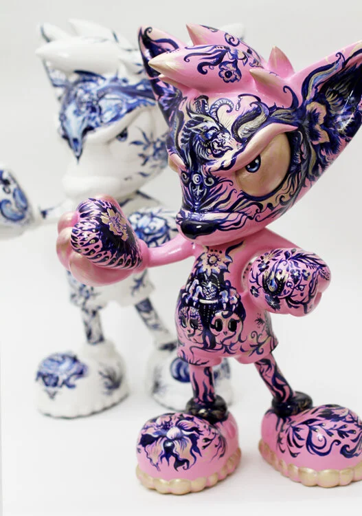 Hand-painted Pjipje sculptures created by Anna Sokolova for the Loes van Delft collaboration, featuring original Contemporary Delft Blue-inspired illustrations on collectible designer figures.