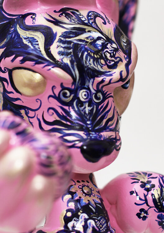 Close-up of the pink Pjipje sculpture featuring hand-painted fox, owl, floral ornament and intricate illustrative details by Anna Sokolova.