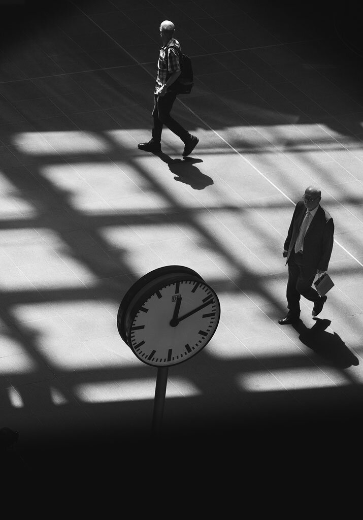 shadows-composition-tips-people-at-station.jpg