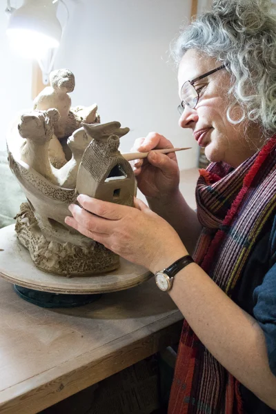 Student working on a sculpture