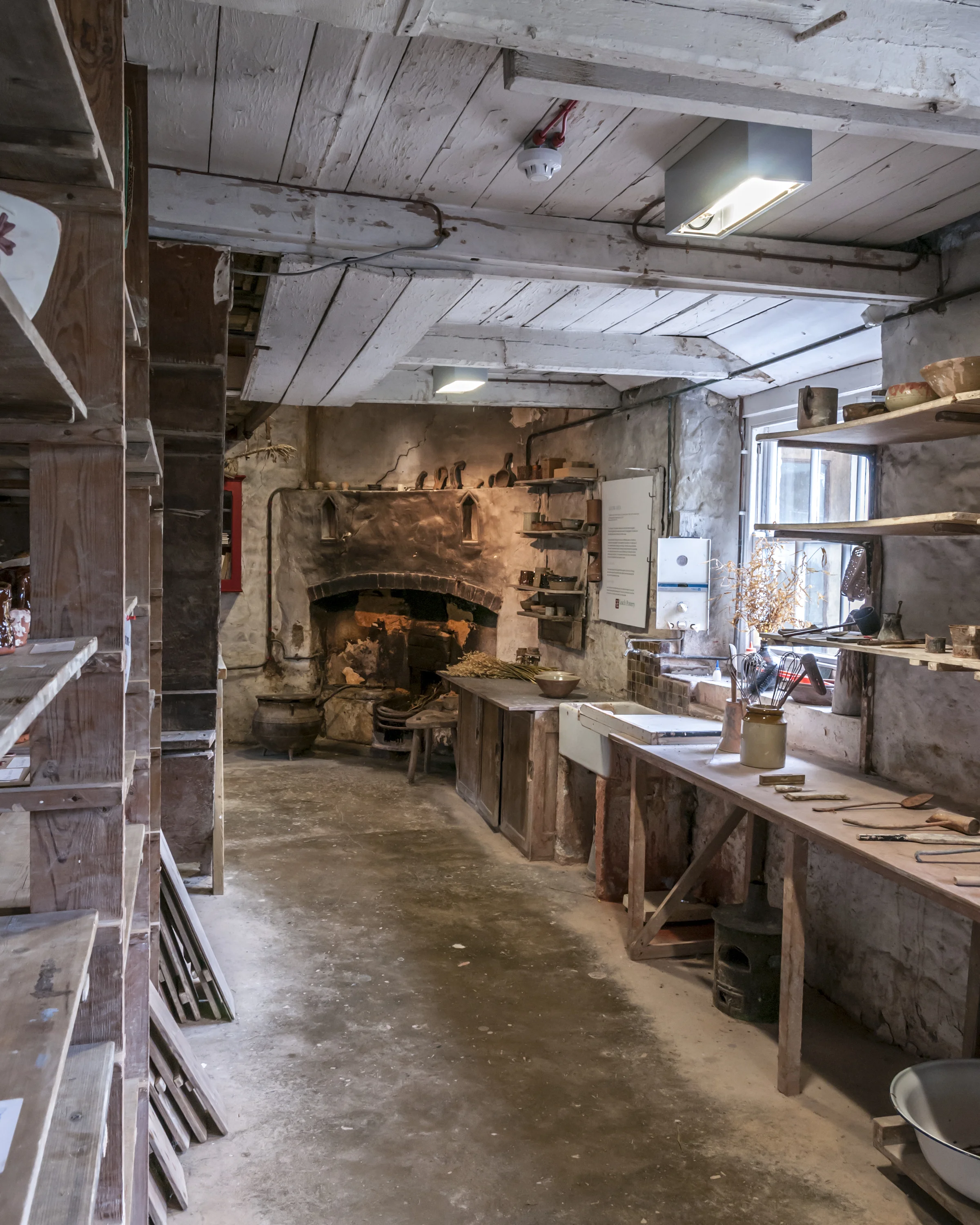 The Old Pottery, glazing room and fireplace