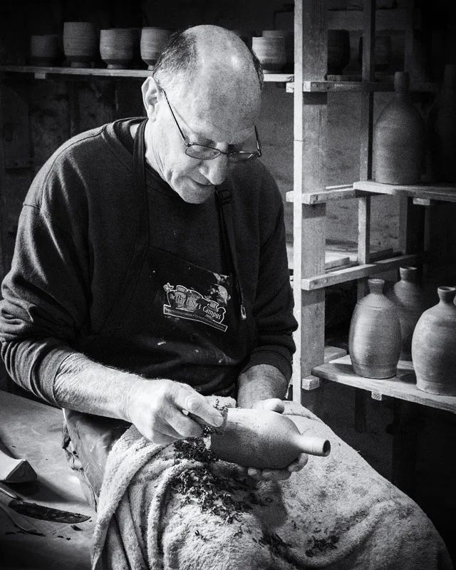 Peter Rose working at the Leach Pottery