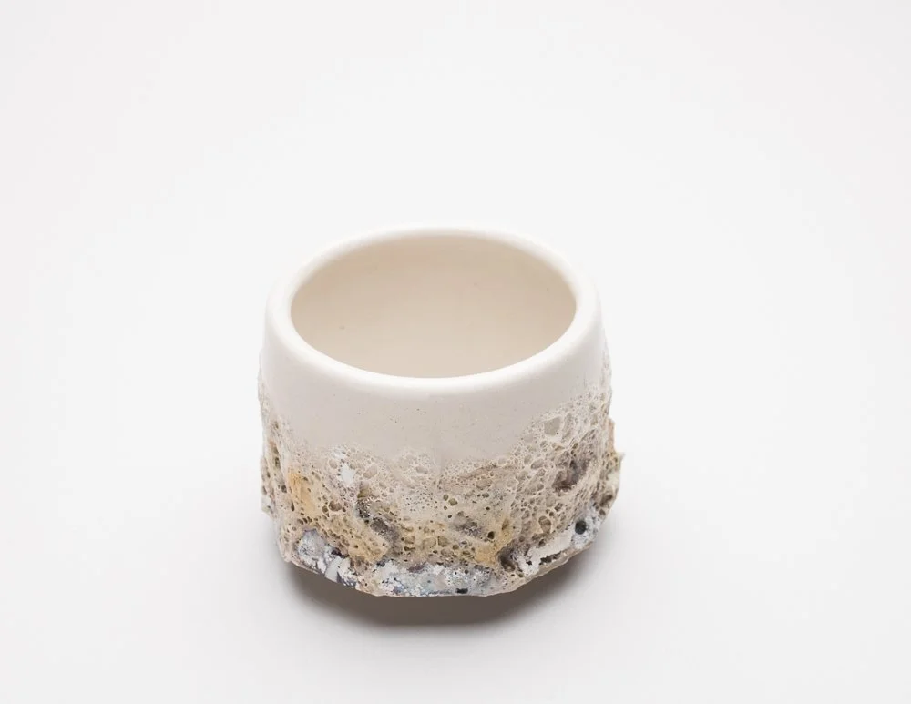 textured yunomi with smooth white glaze and textured effect on the bottom half