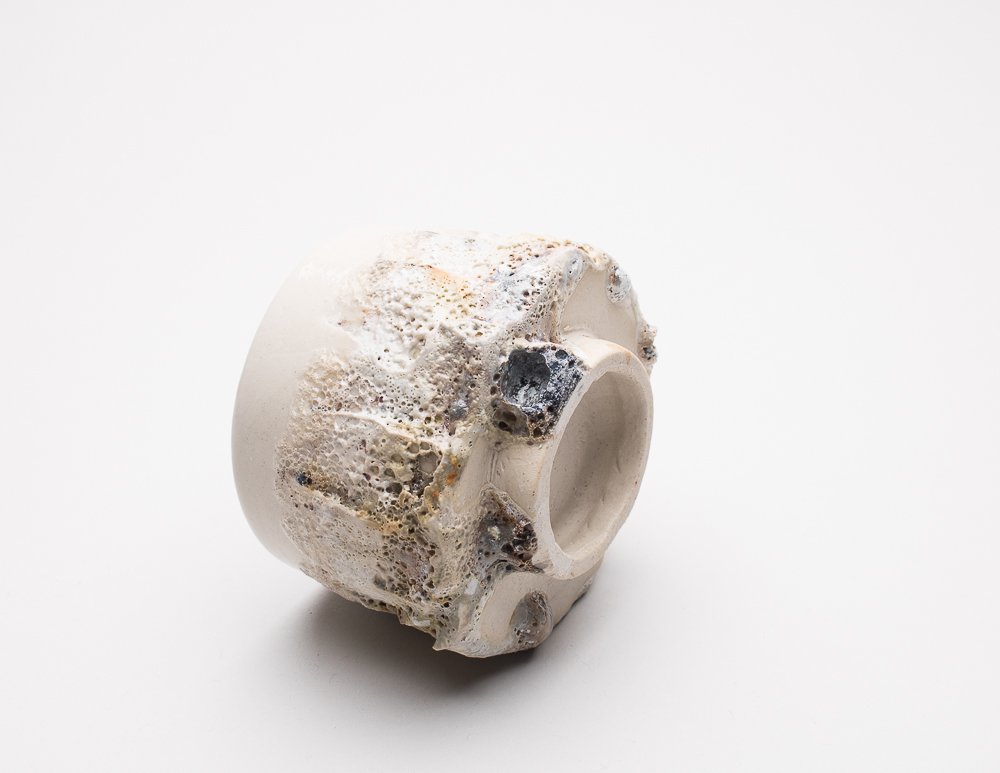 textured yunomi with smooth white glaze and textured effect on the bottom half