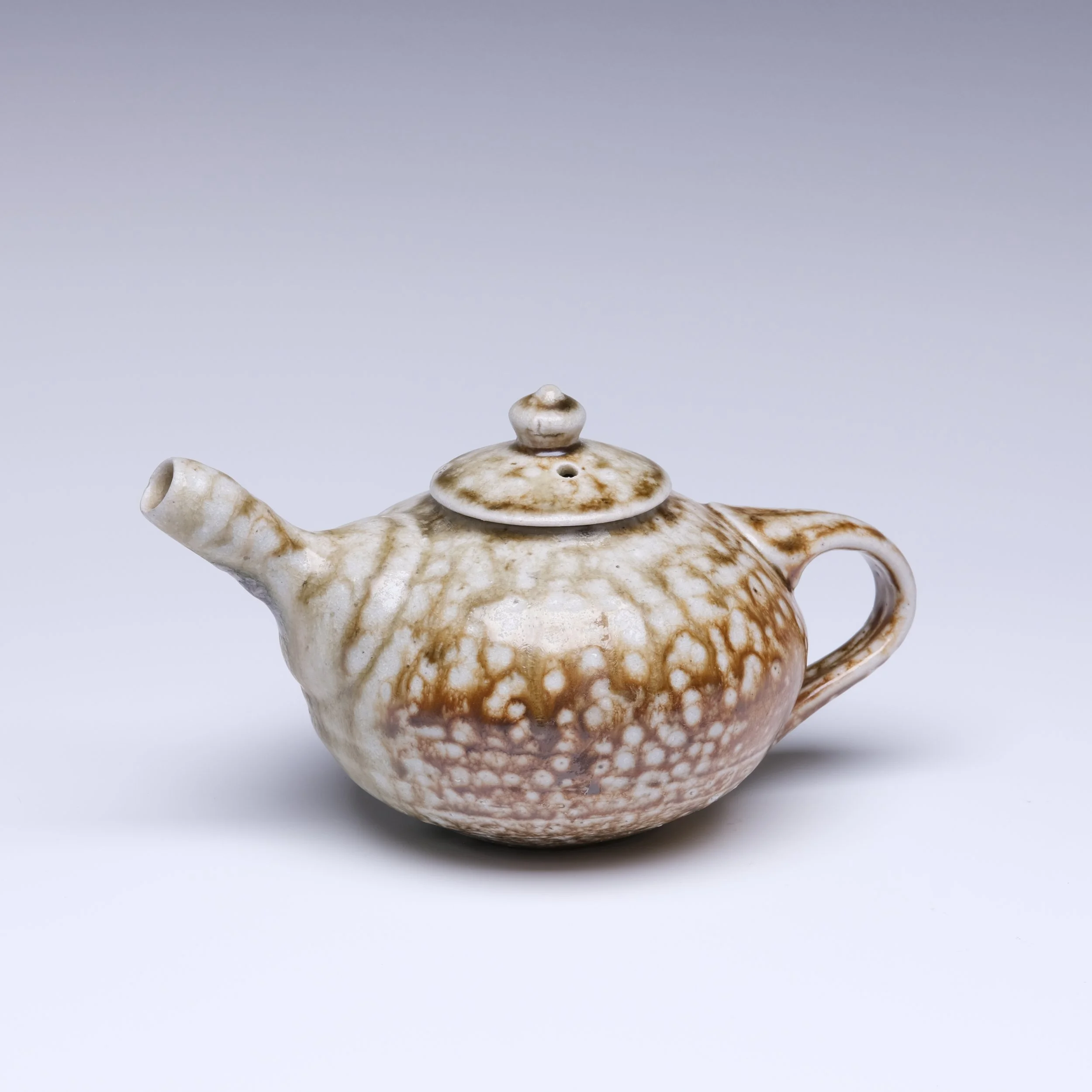 2. Sandy Lockwood stoneware teapot - woodfired and saltglazed.jpg