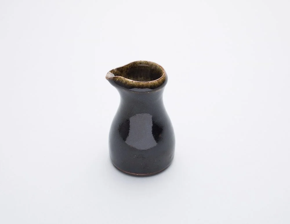 Standward Ware pourer in Tenmuko ( deep black) glaze and thin ash glaze detailing on rim of pourer
