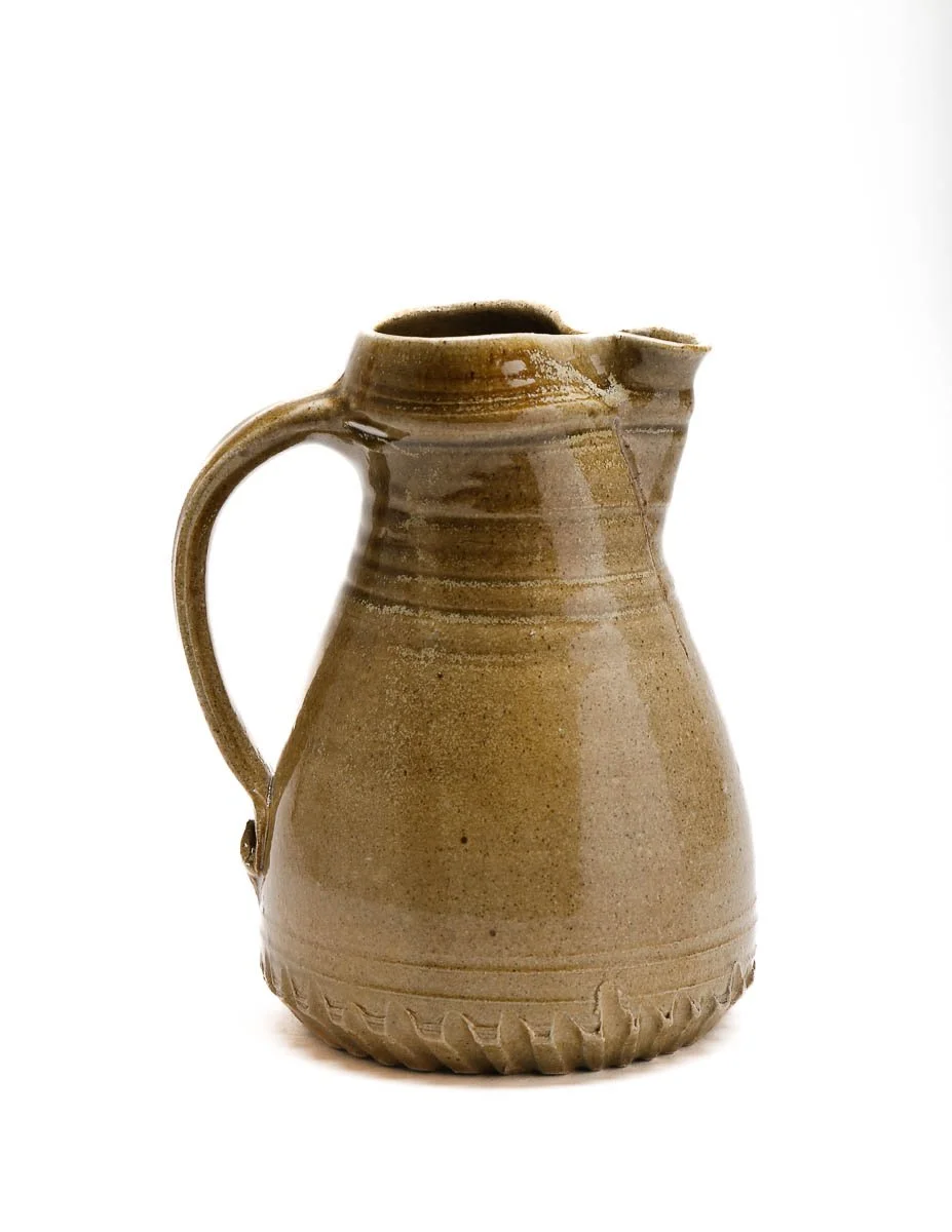 large brown-yellow detailed jug