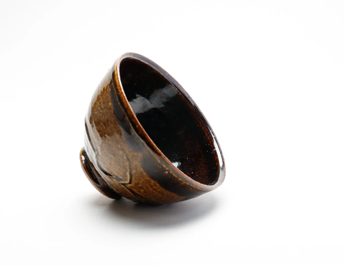 Bowl with amber and tenmoku glaze