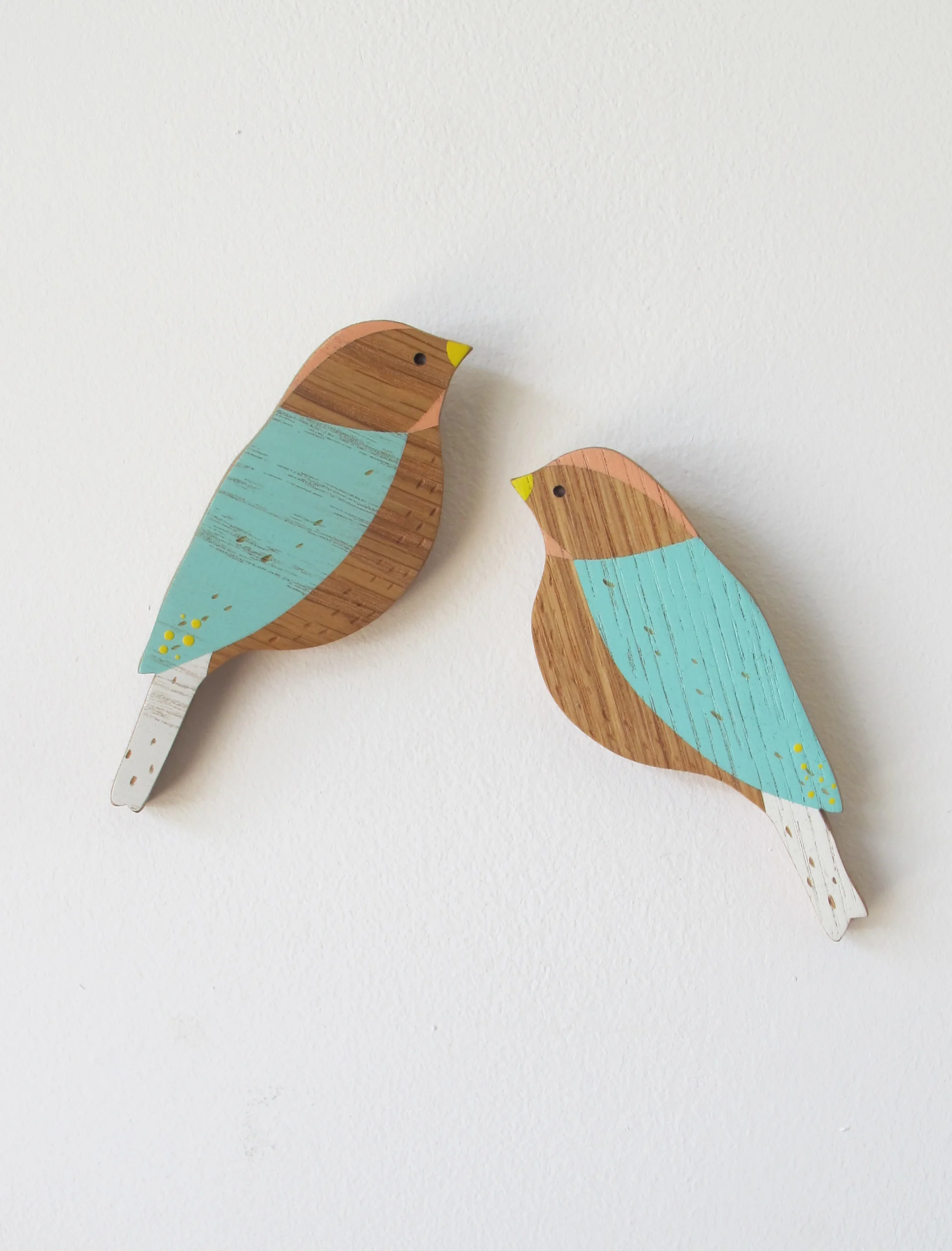 'Anna's birds on the wall by her (very tidy) desk!'