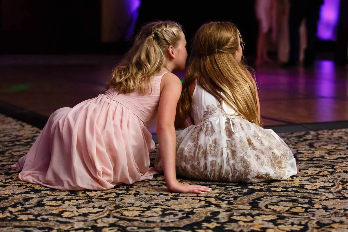 candid-photos-bella-collina-wedding-girls-talking.jpg