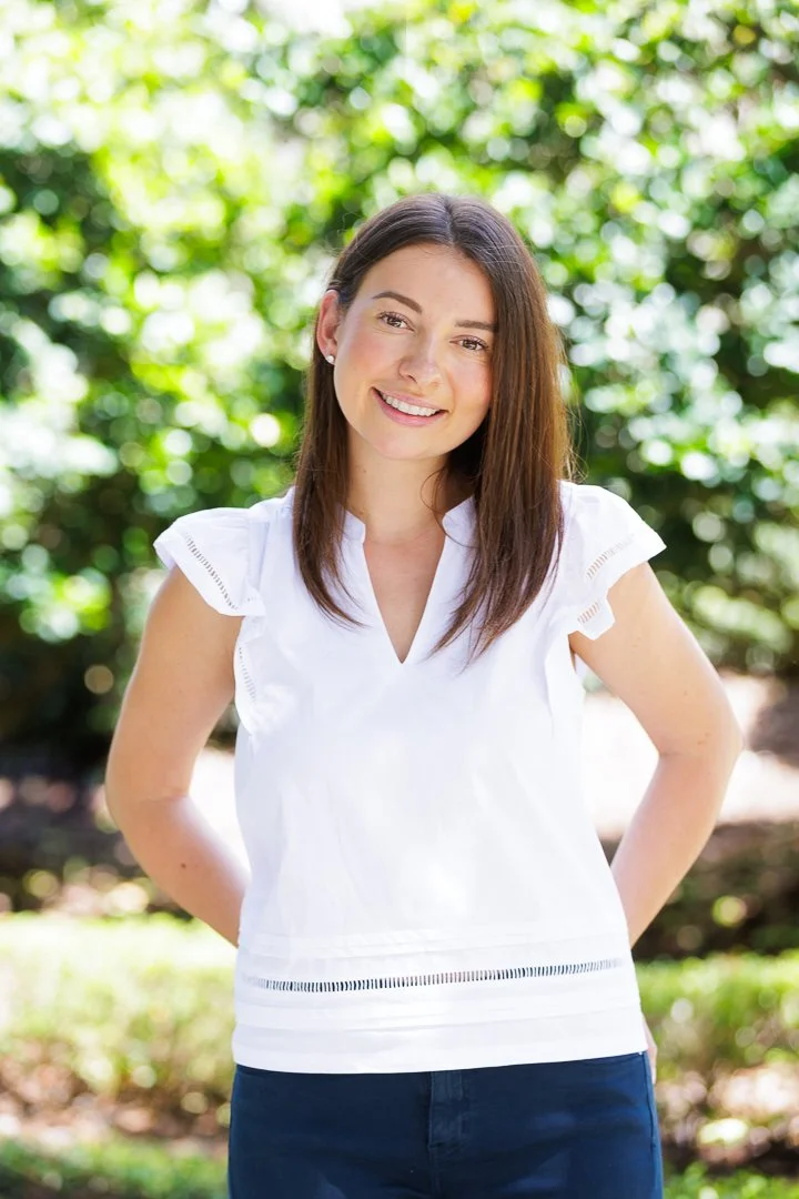 branding photographer with outdoor natural lighting and trees