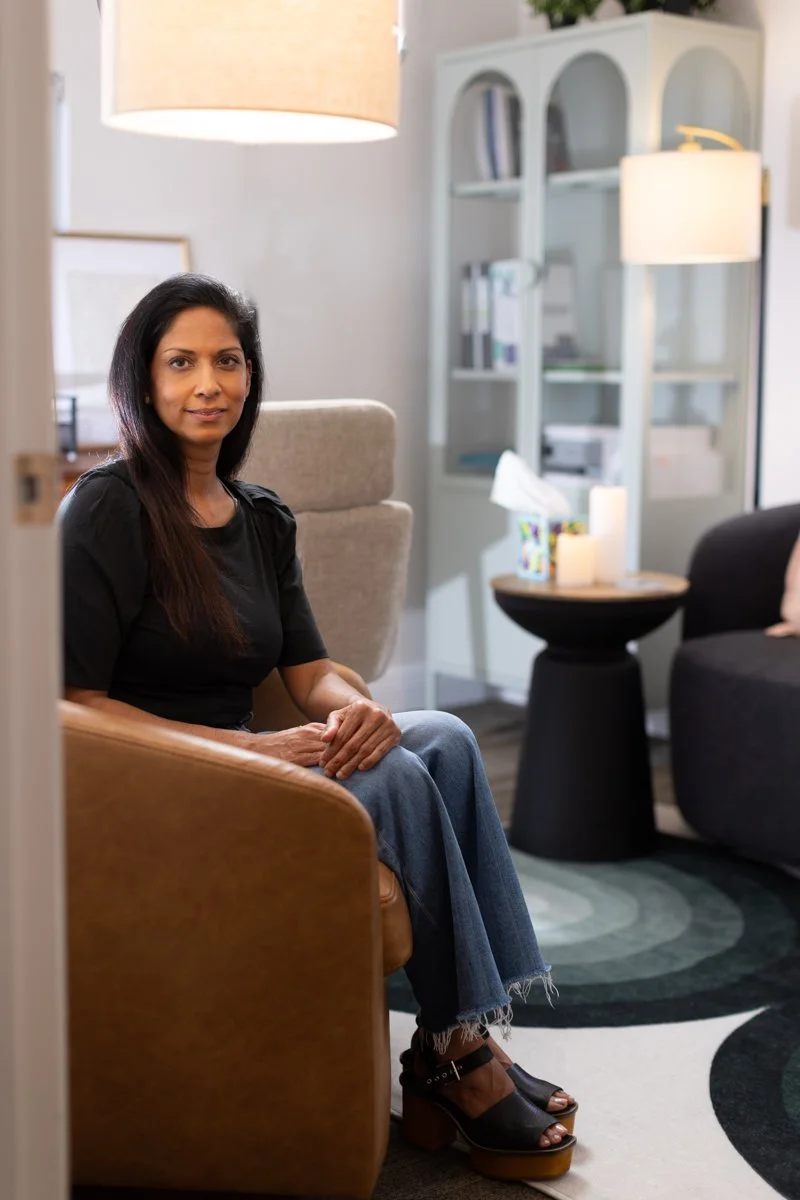 winter park therapist photographed in her office with lamps and chairs