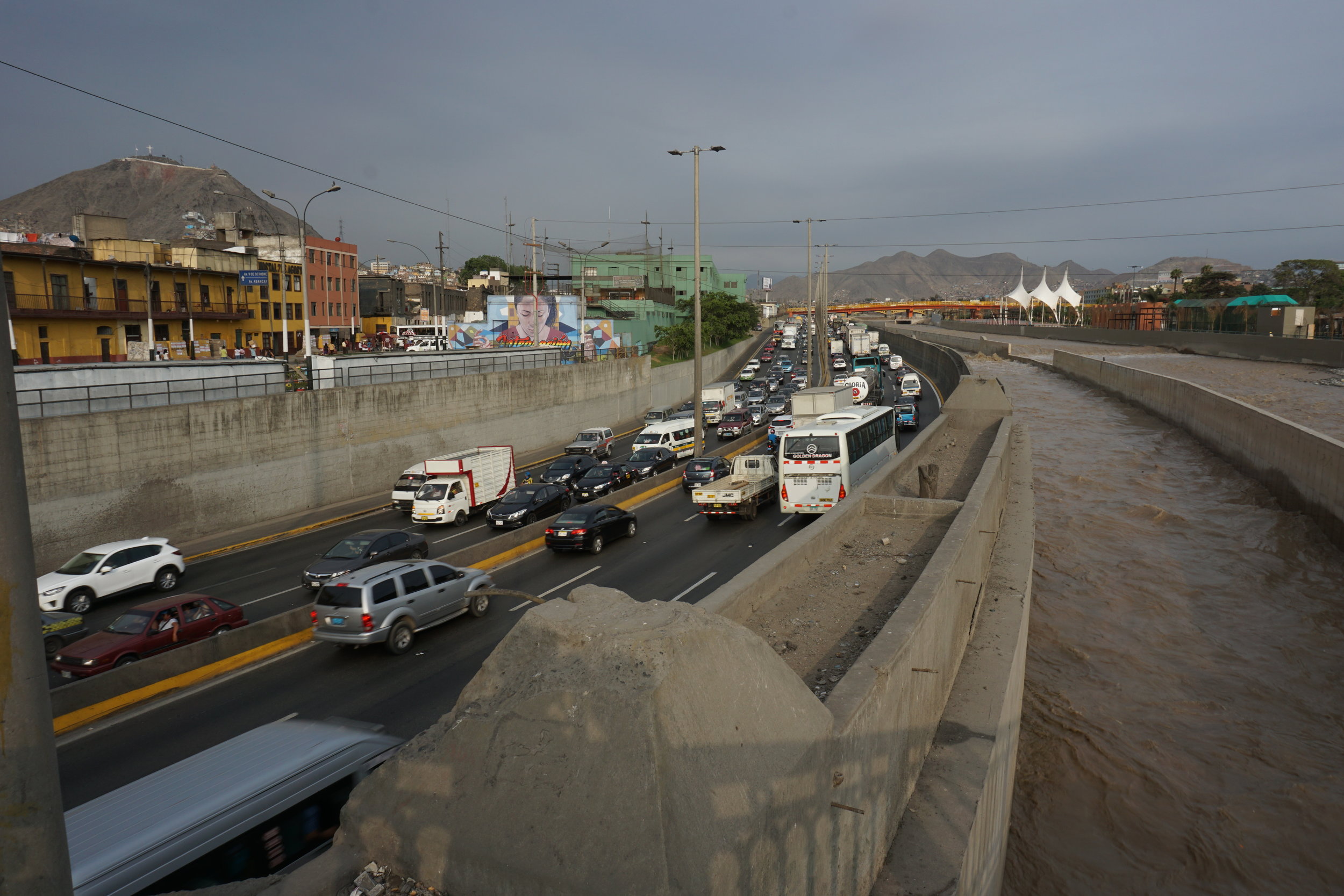  Just steps from the Plaza Mayor, a view of Lima's slums and highway from a bridge above the Rio Rimac.&nbsp; 