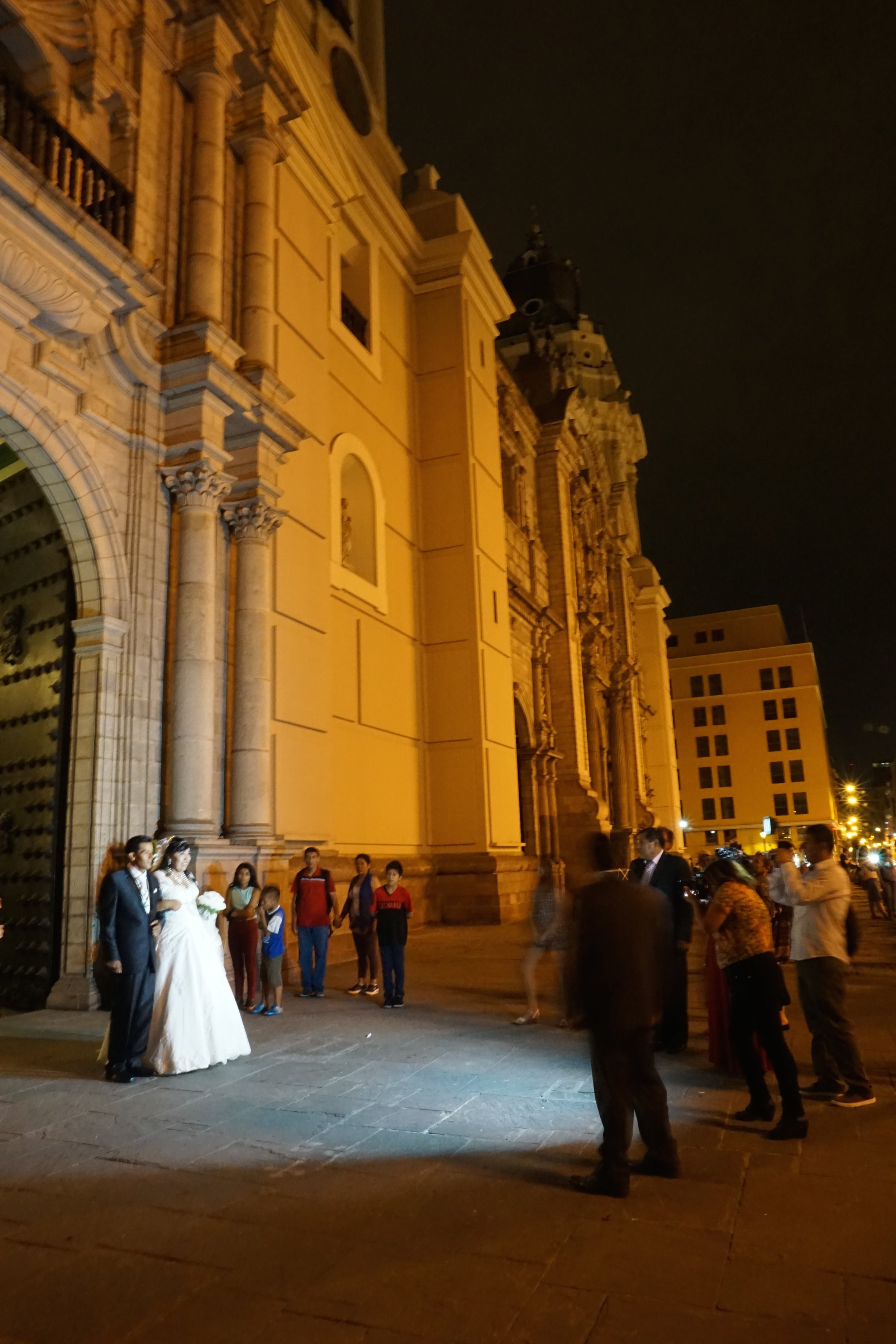 One of the many weddings happening on a weekend evening in Lima's cathedral.