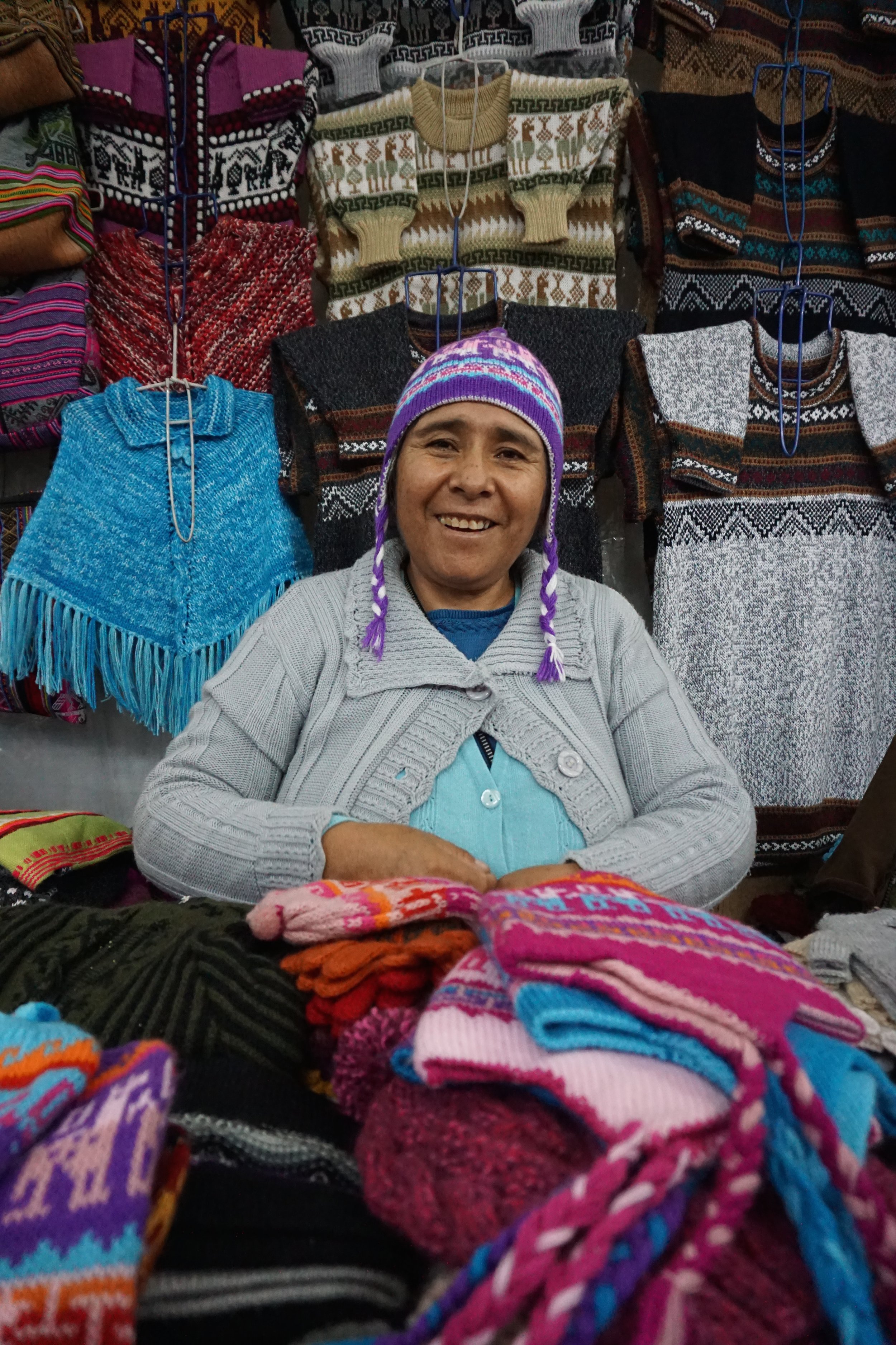  Arequipa is said to be among the best places in Peru to buy hand-made alpaca wool items. We visited an artisan market and stocked up on gifts for family. We bought a couple of hats from this friendly vendor. 