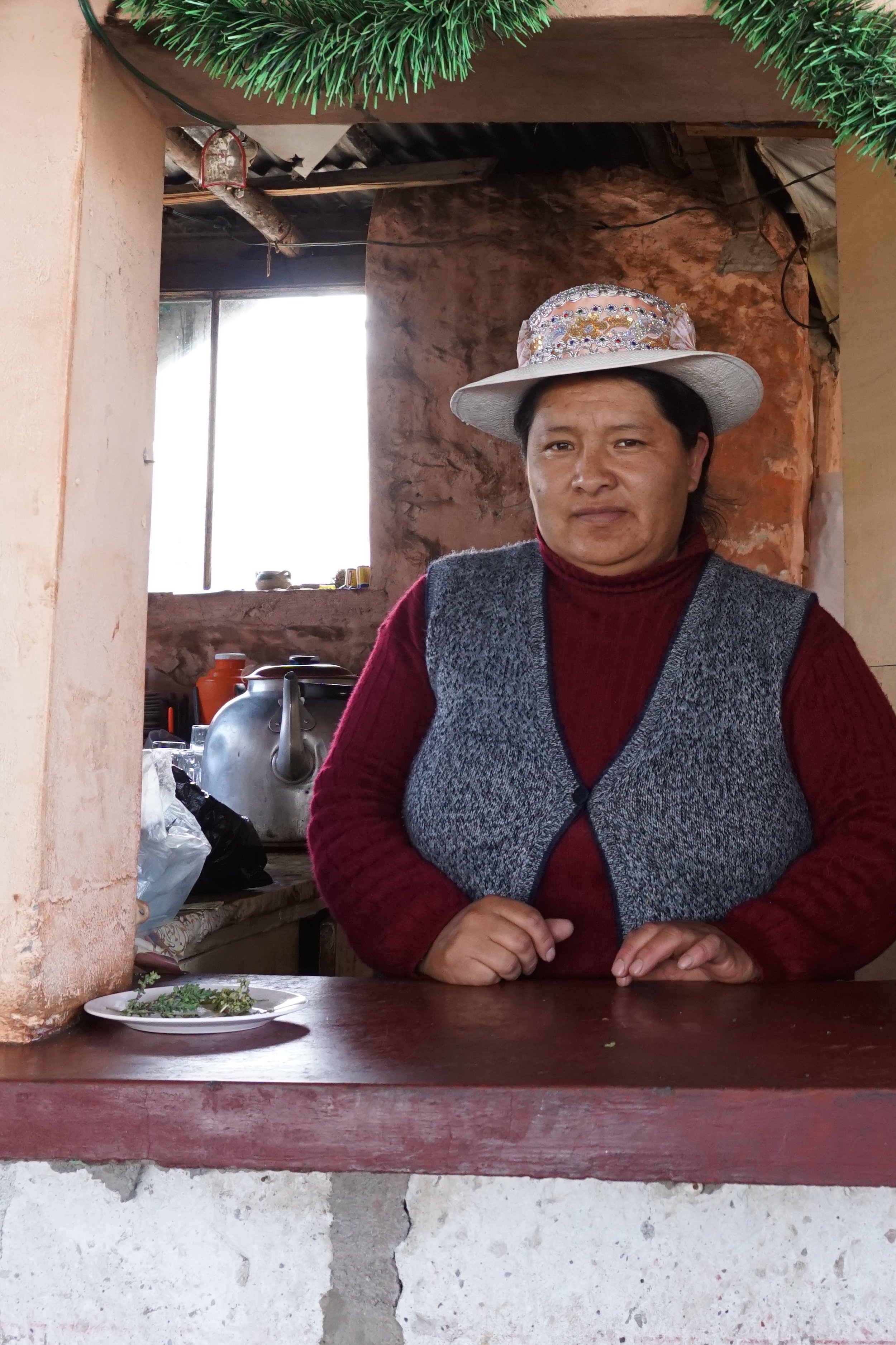  The lady who made our tea infusion (and sold us a wonderfully warm and lovely baby alpaca wool hat). &nbsp; 