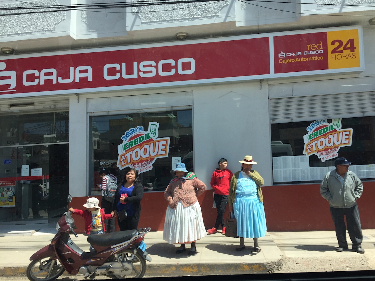 A streetview in Puno, where traditional dress and heritage mix with more Westernized descendants of those colonized by the Spaniards. 