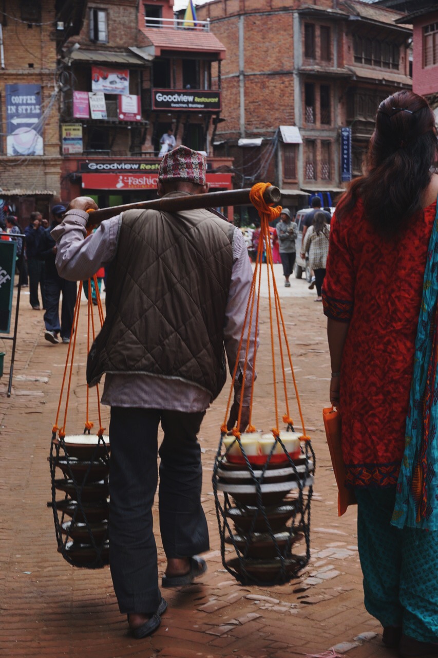  A man selling ‘king curd,’Bhaktapur’s culinary specialty made of sweet buffalo milk, cloves, cardamom, and coconut 