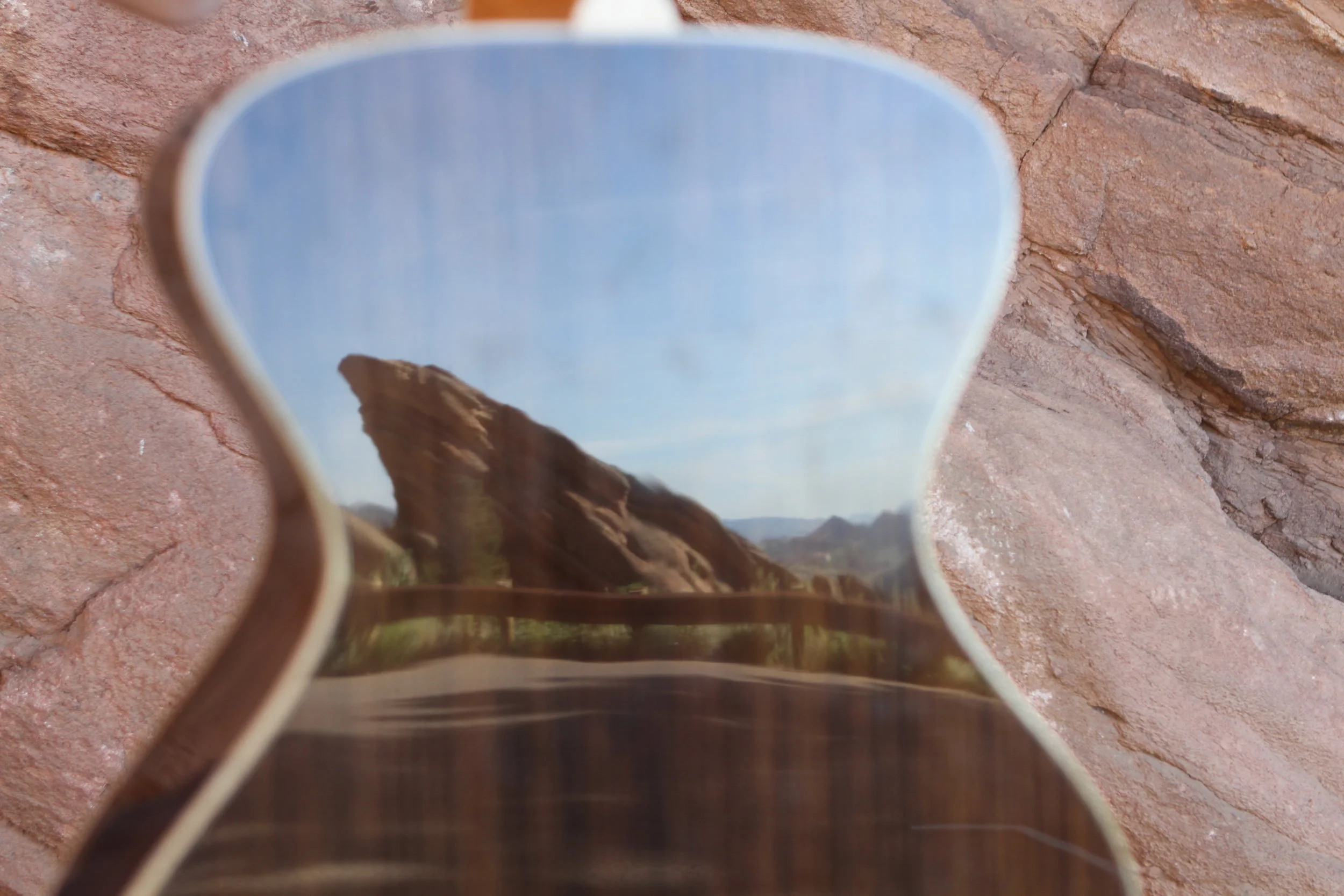  Red Rocks shines in the finish on a back of rosewood. OG model. 
