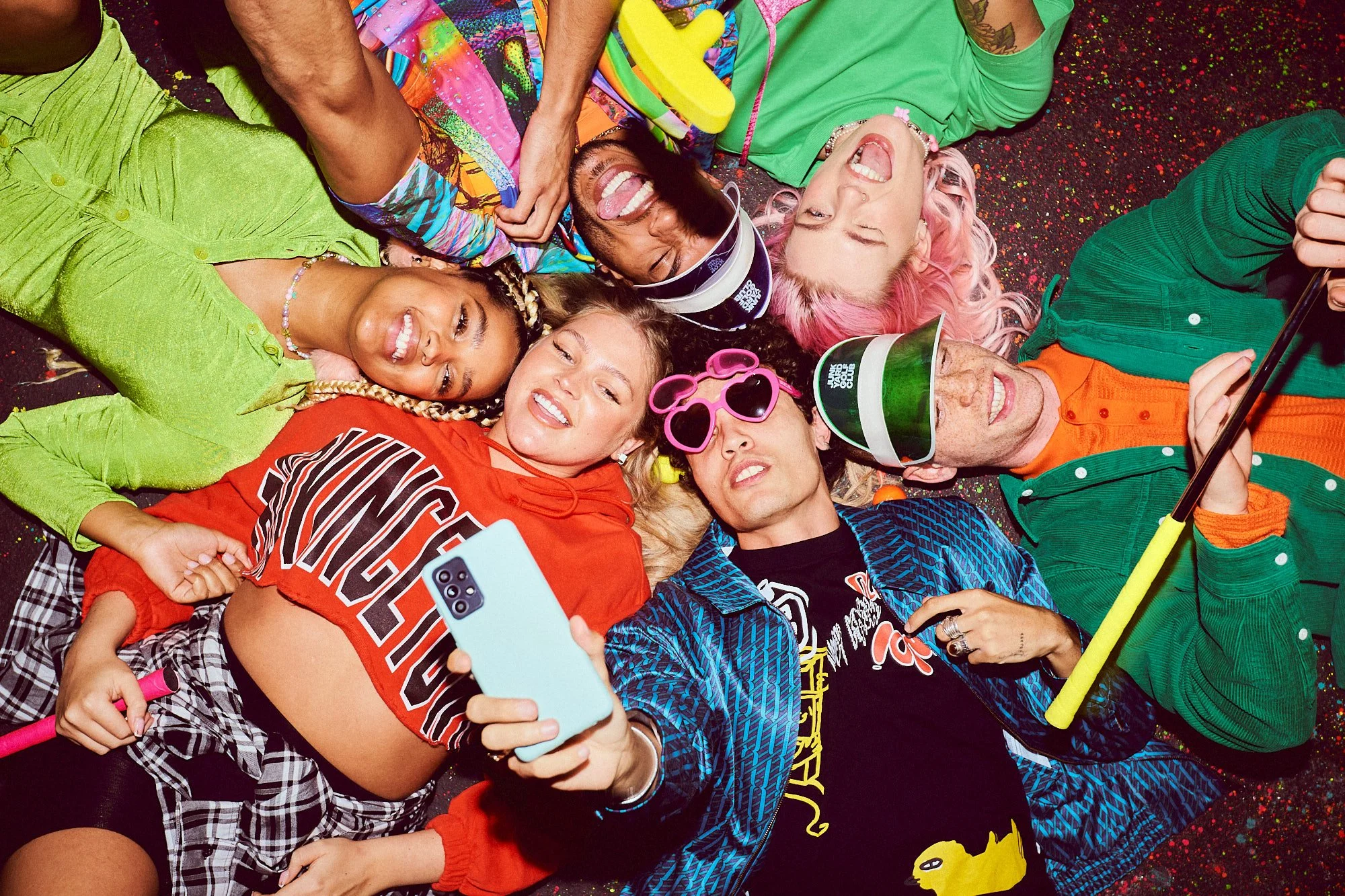 Advertising Photograph of a smiling group taking a selfie in Manchester