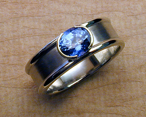 Split bezel blue sapphire band, 14k white gold.