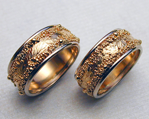 Wedding rings with spherical granulation and branch like textures.