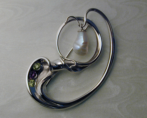 Contemporary art-nouveau brooch with baroque-pearl.