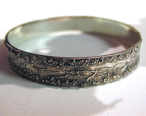 Handcrafted free-form bangle.