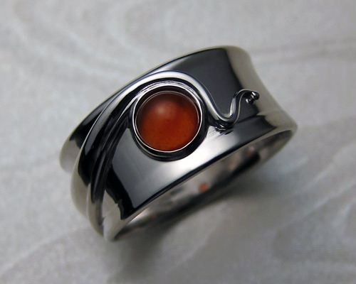 Wraparound free-form band with carnelian stone.