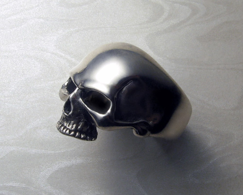 Large, heavy, skull ring.