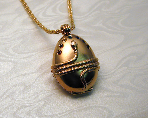 Cosmic, Orphic egg pendant.