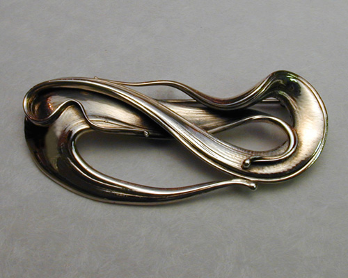 Fluid, organic, Art Nouveau style brooch pin.