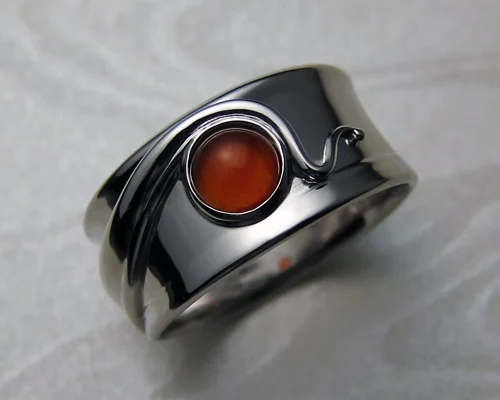 Wraparound free-form band with carnelian stone.
