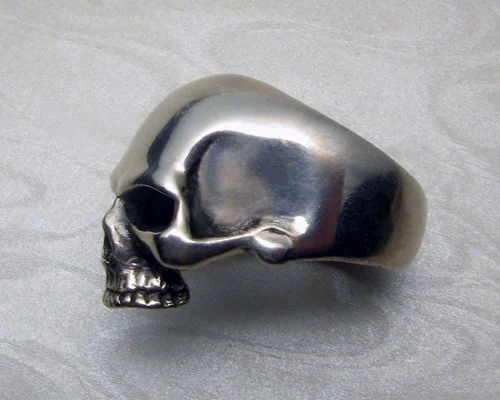 Large, heavy skull ring (profile view)