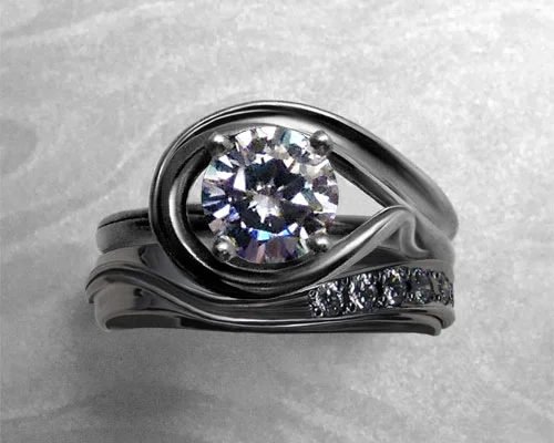 very_unusual_engagement_ring_with_matching_wedding_band
