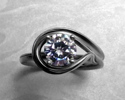 Very unusual engagement ring, with matching wedding band. 18k yellow gold.