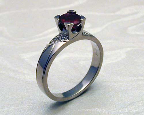 Art Deco engagement ring, ruby with pave diamonds.
