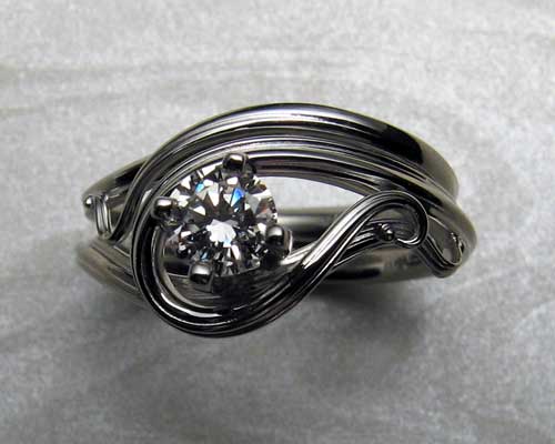 Free form, art nouveau style engagement ring set.