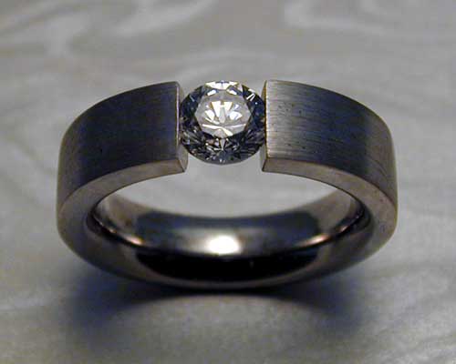 Tension set diamond engagement ring.