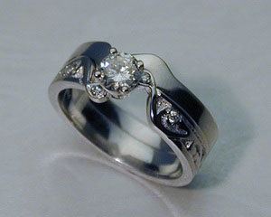 Interlocking engagement ring, wedding band set.