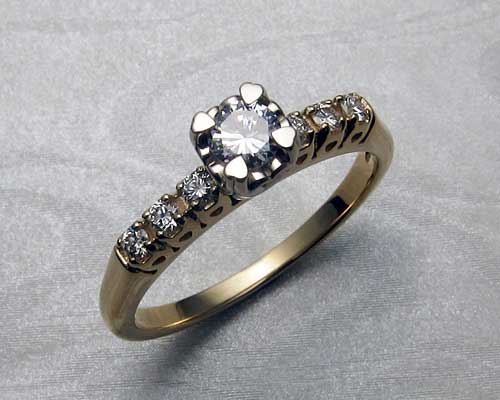 Heart engagement ring with 20 hearts.