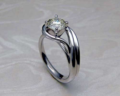 Beautiful asymmetrical engagement ring.