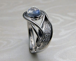 Contemporary, Art Nouveau style engagement ring.