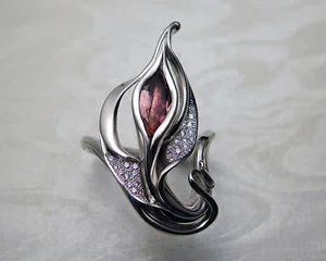 Fluid, organic, lotus engagement rings.