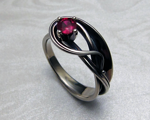 Contemporary Art-Nouveau style engagement ring, with ruby.