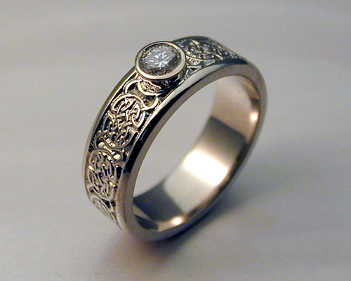 8th to 9th century Celtic wedding band with bezel set diamond. 