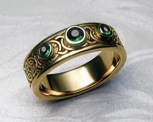 5.5mm_celtic_band-18k-yellow-green-garnets.jpg