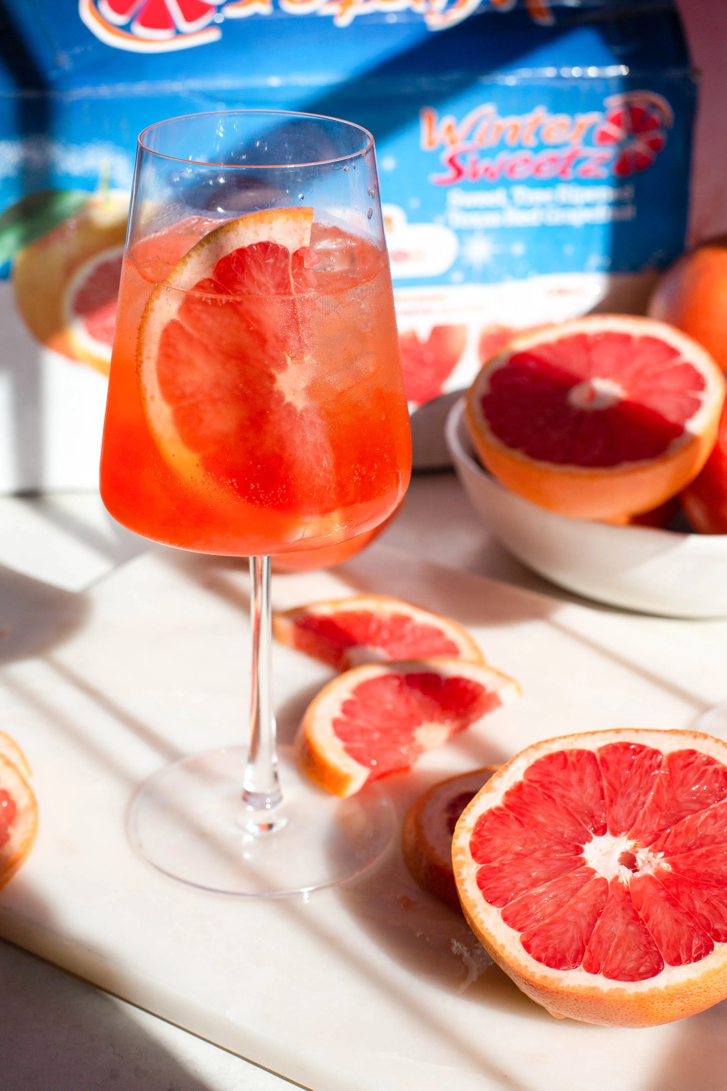 https://images.squarespace-cdn.com/content/v1/525d98f0e4b0f07bb3deb091/016672ea-4fba-4bbf-a99a-27aeceab6304/Grapefruit+Aperol+Spritz