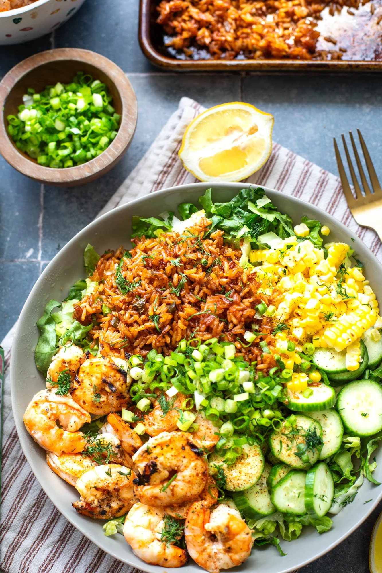 Homemade Cajun grilled shrimp crispy rice salad styled for summer entertaining and family meals.